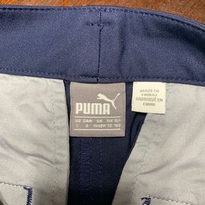 PUMA navy girls golf shorts with pockets.  YL